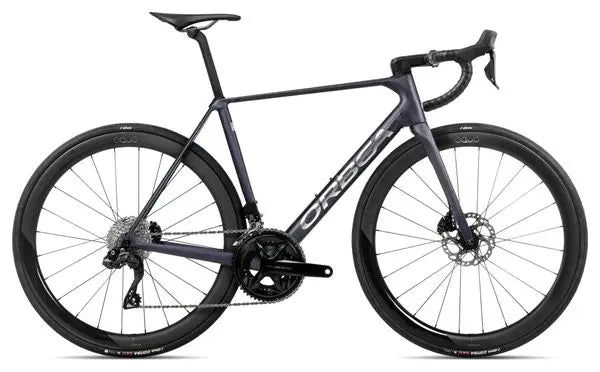 Vélo de Route Orbea Orca M30iLTD PWR Shimano 105 Di2 12V 700 mm Bleu Violet Tanzanite Carbon Raw 2025 JARDINS LOISIRS